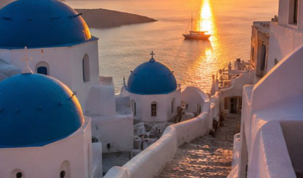 Santorini Caldera Hideaway blue dome sunset lane